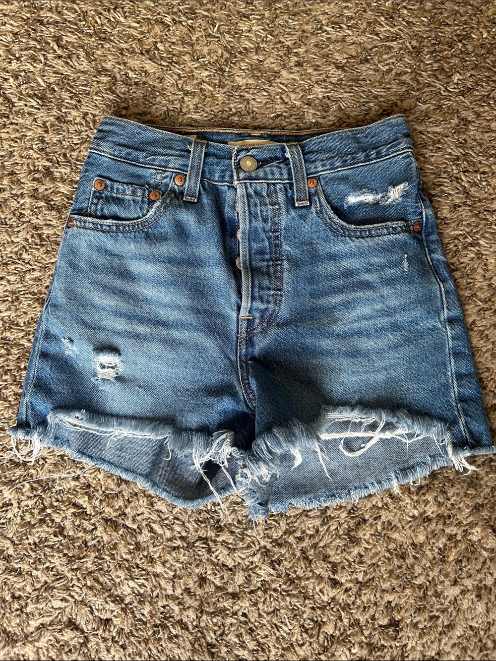 Levi’s Ribcage Shorts Distressed Hems - Women’s 24